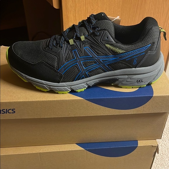 ASICS Black and Blue Running Shoes
Extra wide width - Picture 2 of 5